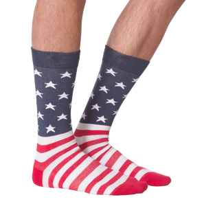 A pair of red, white, and blue striped socks with stars on the leg portion.