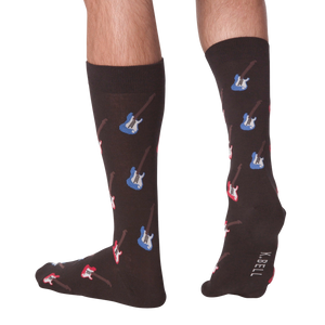 A pair of brown socks with a pattern of red and blue guitars.