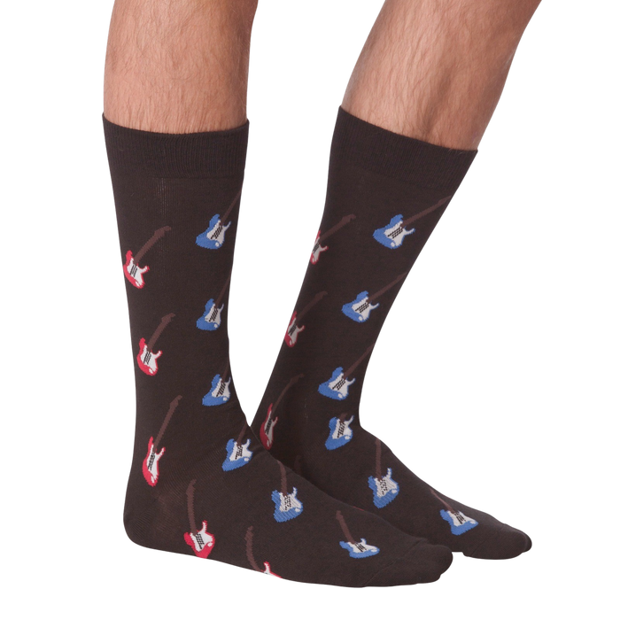 A pair of brown socks with a pattern of red and blue guitars.