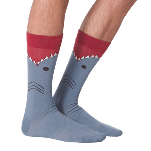 Another lifestyle shot showing the Shark XL socks from the back on a person's legs.