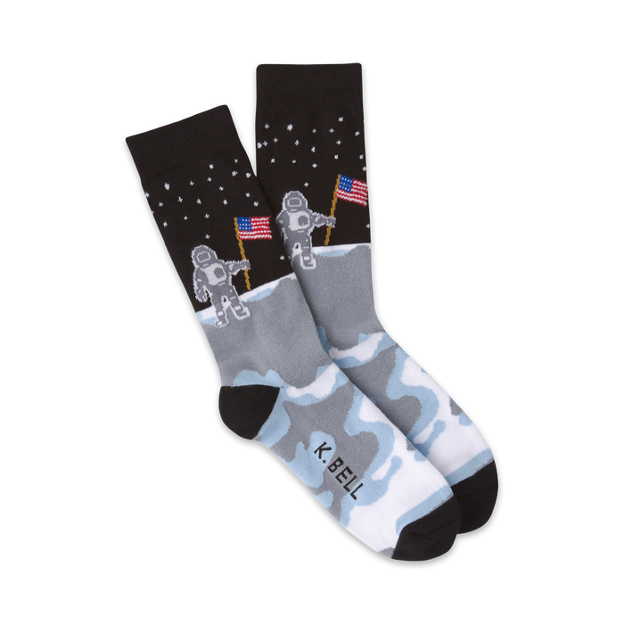 black crew socks with moon, stars, and us flag-clad astronaut design.    }}