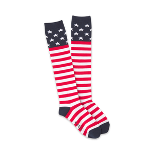 Pair of red, white, and blue knee-high socks with an American flag design.  Stars at the top, stripes on the lower leg.