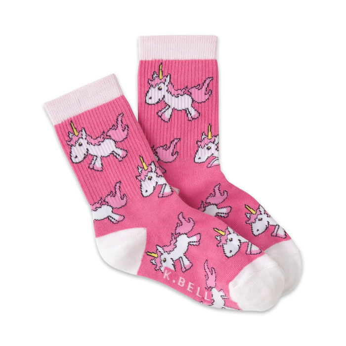 spark imagination in pink and white unicorn crew socks for kids, featuring white unicorns with pink manes and saddles. }}
