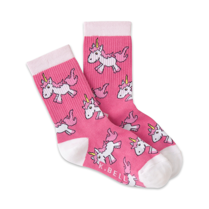 Pink crew socks with a pattern of cute pink and white unicorns. White cuffs. }}