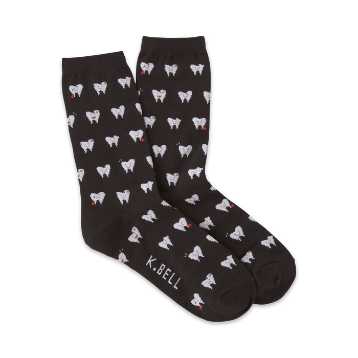 Pair of dark gray crew socks with a repeating pattern of white teeth and small red hearts. The socks are made by K.Bell. }}