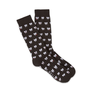 Pair of dark brown crew socks with a repeating pattern of white cartoon teeth with red details.  The socks are shown folded.