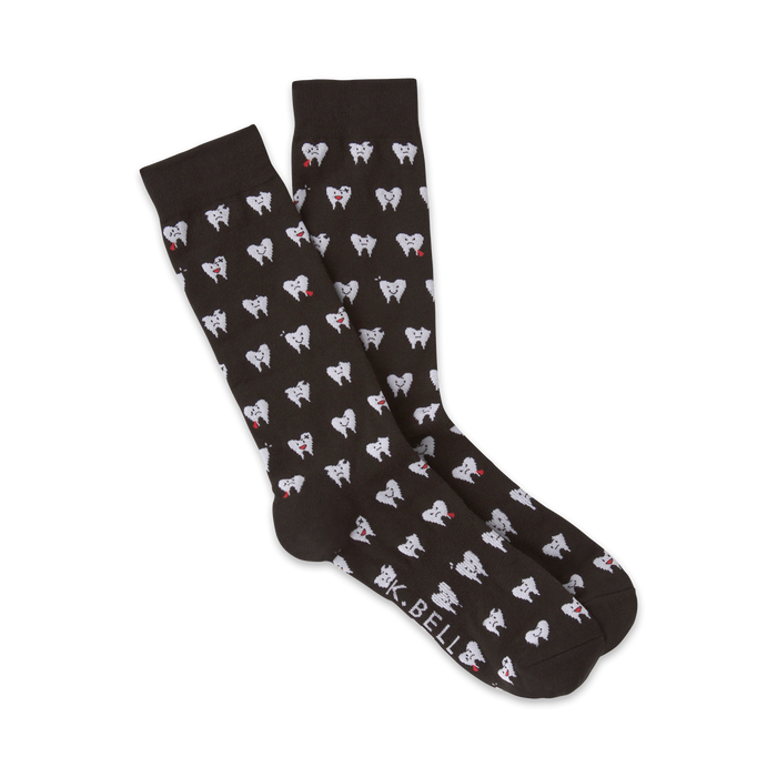 Pair of dark brown crew socks with a repeating pattern of white cartoon teeth with red details.  The socks are shown folded.