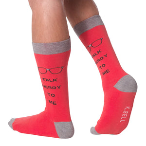 Lifestyle shot of a model wearing a pair of red 'Talk Nerdy To Me' socks.