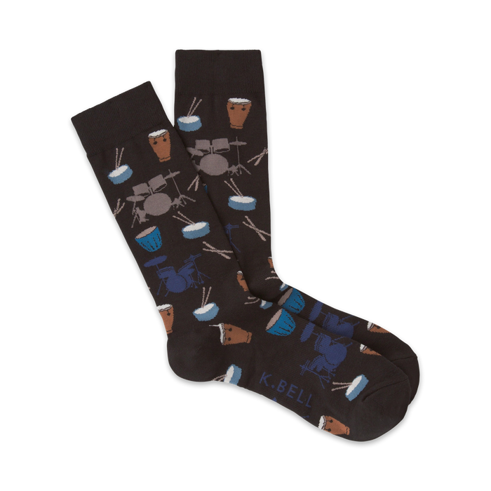 brown crew socks with repeating pattern of drums, drumsticks, and cymbals.   