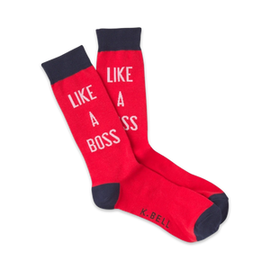 Pair of red crew socks with navy blue cuffs.  White text on socks reads 'LIKE A BOSS'.
