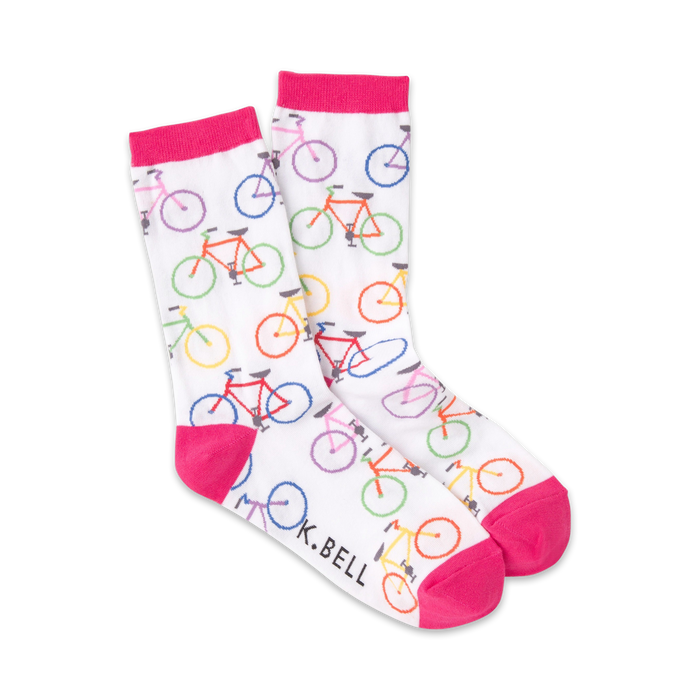 A pair of white crew socks adorned with colorful bicycle illustrations. Pink accents on the cuffs and toes add a playful touch. }}
