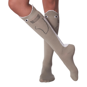 Lifestyle shot: Model's legs showing off the knee-high shark socks with legs crossed.
