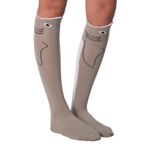 Lifestyle shot: Model's legs crossed, wearing the shark socks. Socks are front and center.