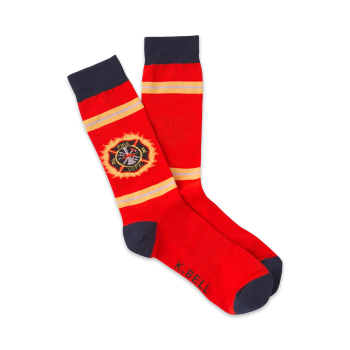 Pair of red crew socks with navy blue cuffs. Features a yellow and red fire department emblem and 'K.BELL' on the sole. }}
