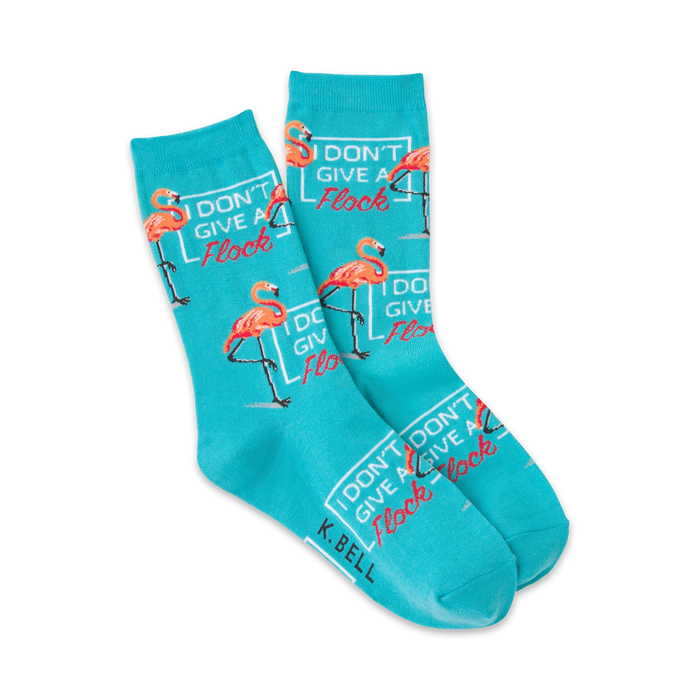 blue crew socks with pink flamingo pattern and the words 'i don't give a flock'  
