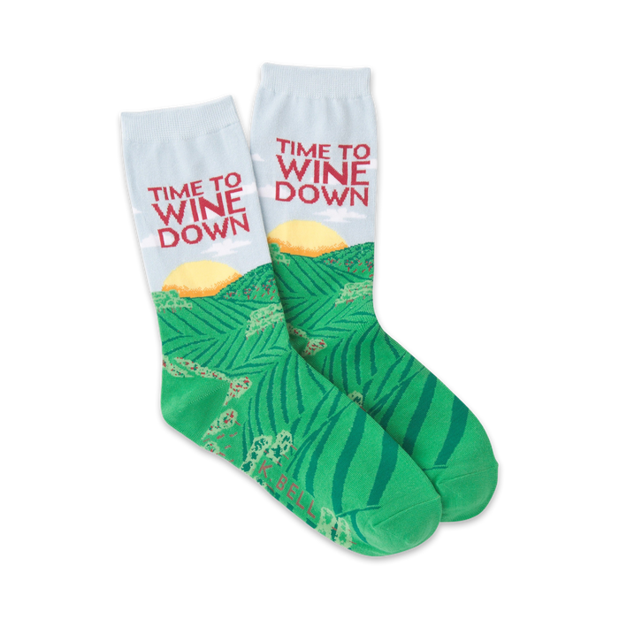 Pair of crew socks. Light blue, green, and red. 'Time To Wine Down' text and vineyard illustration. }}