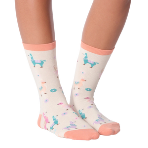 Another lifestyle shot of a person's legs wearing the llama socks, from a slightly different angle.