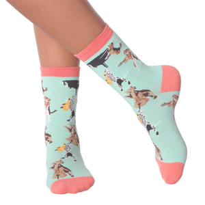 Lifestyle shot of a person wearing the Musical Dogs socks, showcasing how they look on the feet.