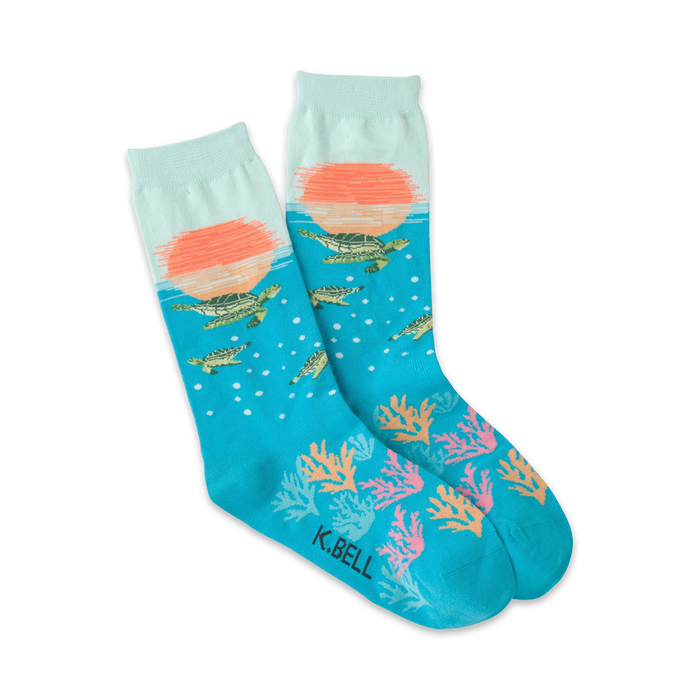 blue crew-length socks for women featuring sea turtles, coral, and sunset design.    }}