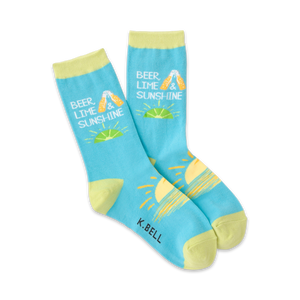 Pair of women's crew socks in light blue and pale yellow. Design features beer bottles, limes, and a sunshine graphic with the text 'Beer Lime & Sunshine'.