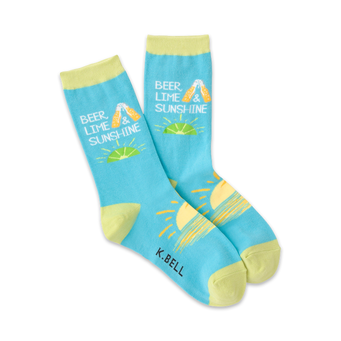 Pair of women's crew socks in light blue and pale yellow. Design features beer bottles, limes, and a sunshine graphic with the text 'Beer Lime & Sunshine'.