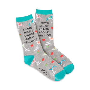 Gray crew socks with teal cuffs, featuring martini glasses, olives, cherries, and the text 'I HAVE MIXED DRINKS ABOUT FEELINGS'.