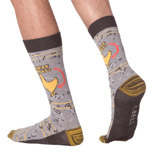 Lifestyle shot showing the socks on a person's feet, demonstrating fit and style.