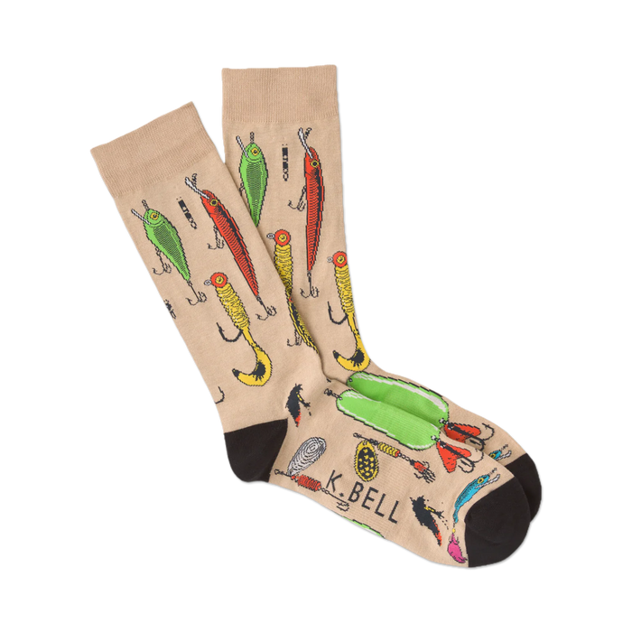 Pair of tan crew socks with a fun pattern of colorful fishing lures.  Black cuffs.