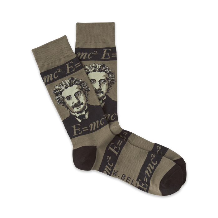 Pair of crew socks in olive green and brown. Einstein's portrait and the equation E=mc² are featured in a repeated pattern.