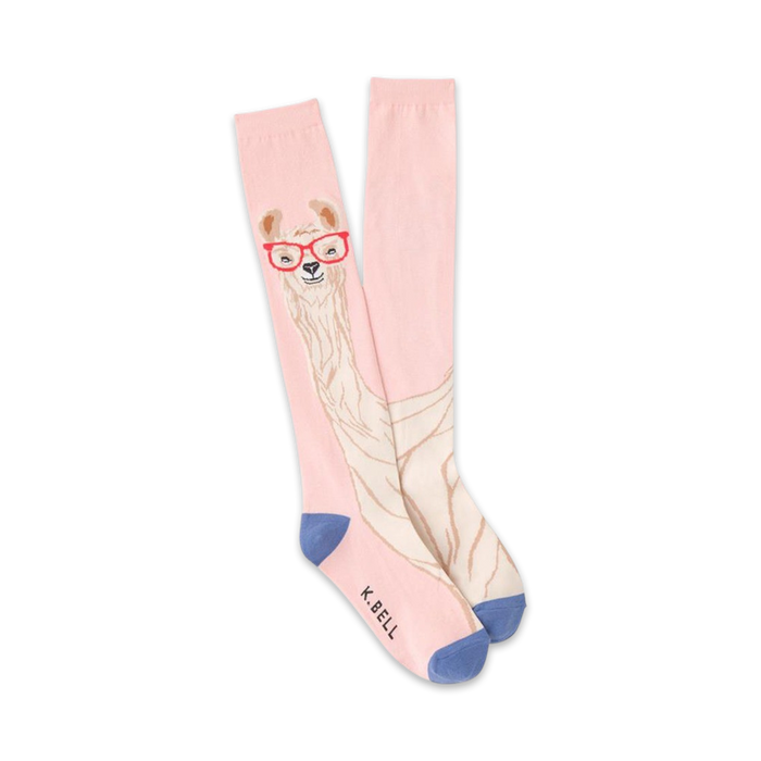 Pair of pink and cream knee-high socks featuring a whimsical illustration of a llama wearing red glasses. Blue accents at the cuffs.