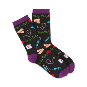 Lifestyle shot of black medical socks with purple cuffs, showing the socks on a person's feet from the ankles down.
