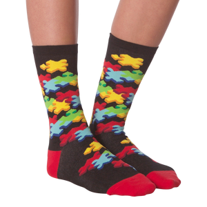 Close-up view of the 3D Jigsaw socks from the front, showcasing the colorful puzzle piece pattern.