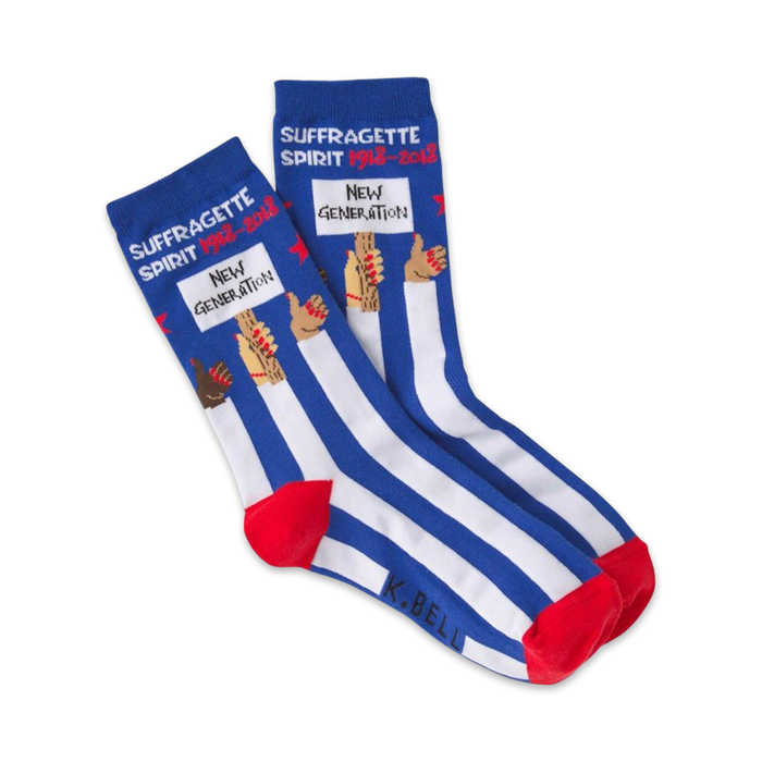 Pair of blue and white striped crew socks.  Features a design of diverse hands holding a sign that says 'Suffragette Spirit 1918-2018, New Generation'. }}