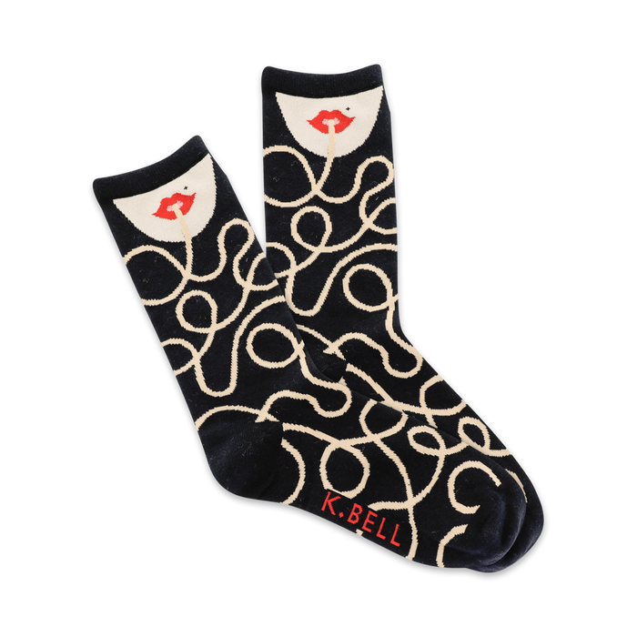Pair of navy crew socks with a cream spaghetti-like pattern and a red-lipped face graphic at the top. }}