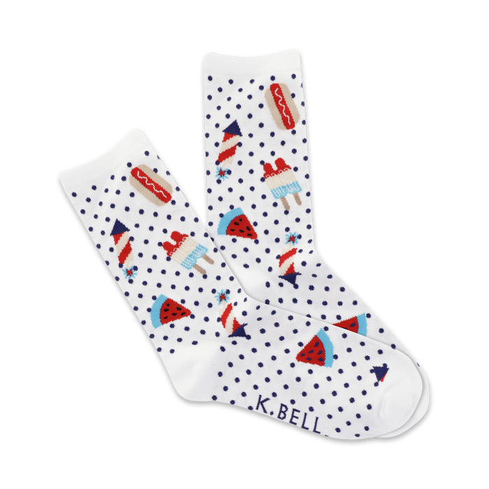 A pair of white crew socks with a navy polka dot pattern and fun summer picnic themed designs: hot dogs, watermelon slices, ice pops and fireworks. }}