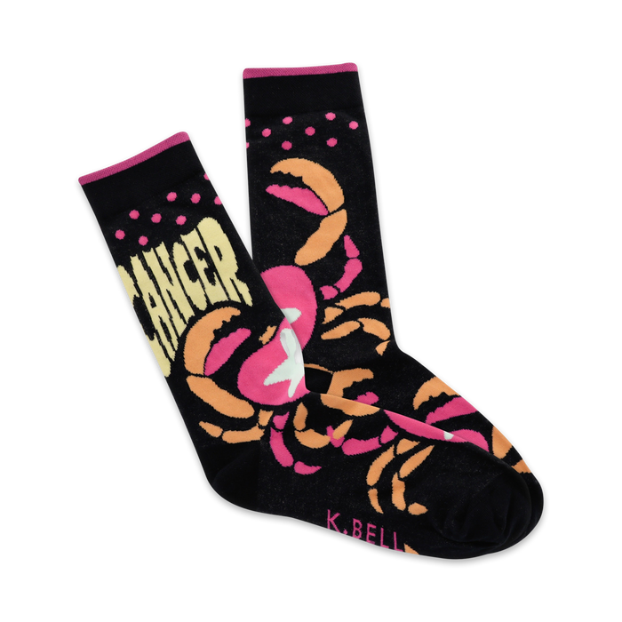 A pair of black crew socks with a pink and orange crab design and the word 'Cancer' printed on them. }}