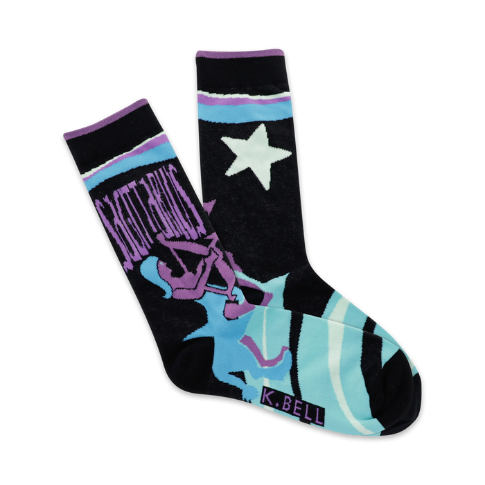 A pair of black crew socks with a teal, purple, and white Sagittarius design and a star. The brand K.BELL is visible on the sole. }}