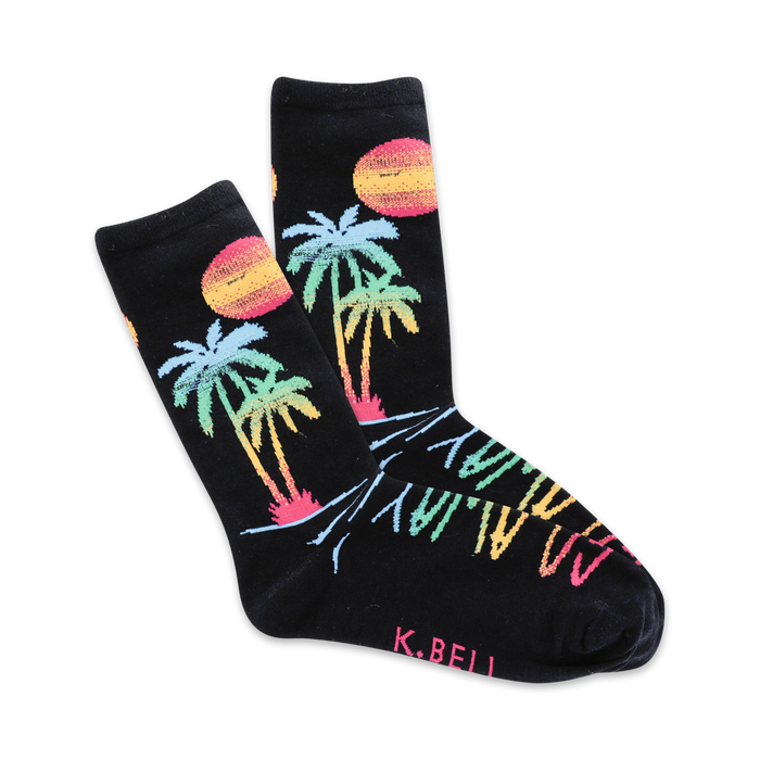 Pair of black crew socks with a colorful sunset, palm trees, and 'Go Away' text design. }}