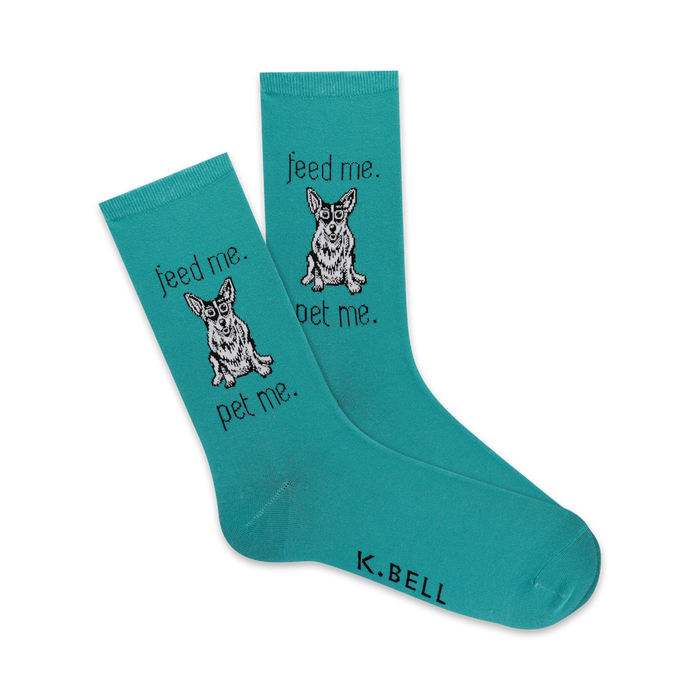 Teal crew socks with a black and white corgi graphic and the phrases 'Feed me' and 'Pet me' repeated on each sock. }}