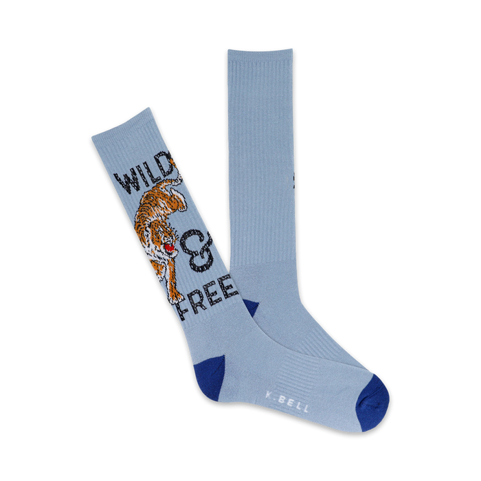 light blue socks with dark blue toe, heel, and top. orange, black, and white tiger on front with 'wild & free' above and below it. mens crew length.     }}