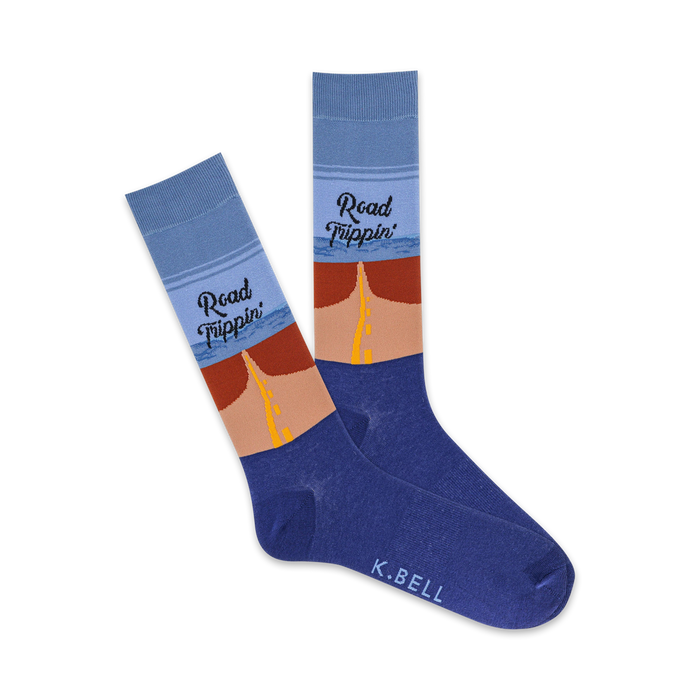 Crew socks in blue, tan, and orange, depicting a highway scene and the text 'Road Trippin'. }}
