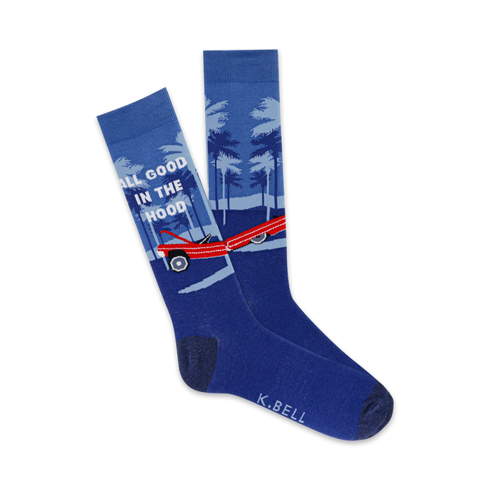 Pair of blue crew socks. Features a red vintage car, palm trees, and the phrase 'All Good in the Hood'. }}
