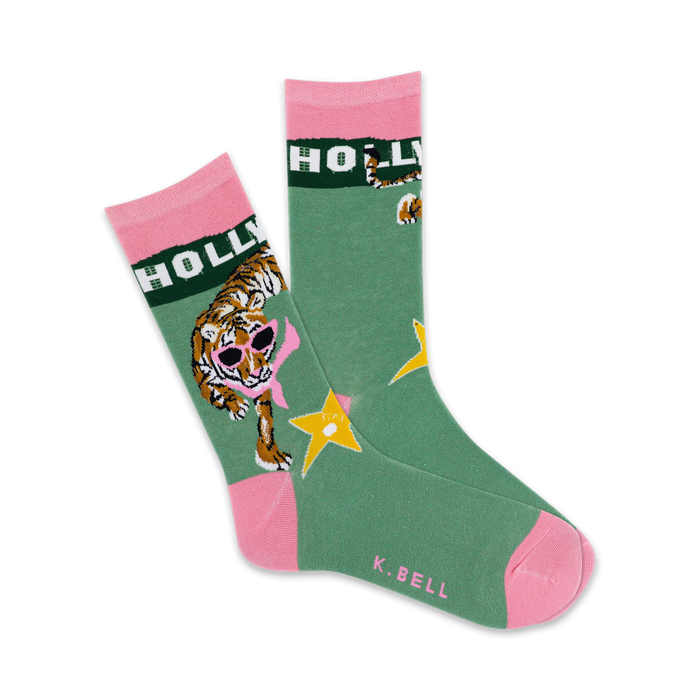 green & pink crew socks with hollywood theme feature stars & a sunglass-wearing tiger.   }}