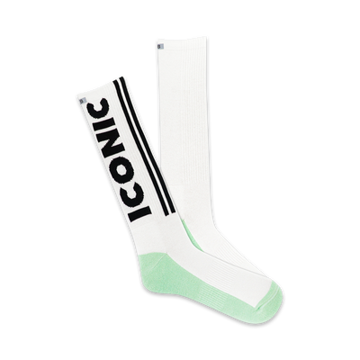 A pair of white crew socks with a black 'Iconic' logo and mint green heel and toe.