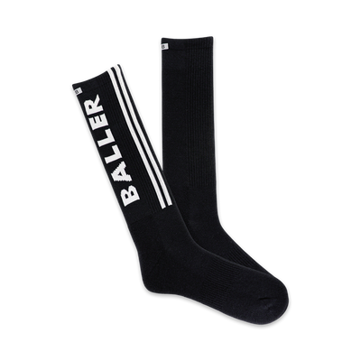 Pair of black crew socks with white stripes and 'BALLER' lettering down the side.