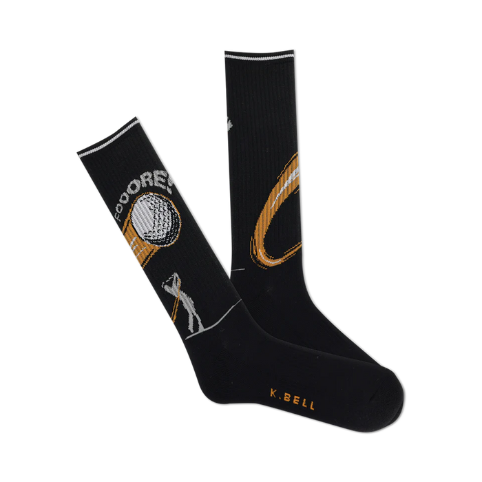 A pair of black crew socks with a golf-themed design.  Features a gold golf ball, player, and swing graphic.  'Fooore!' text is visible. }}