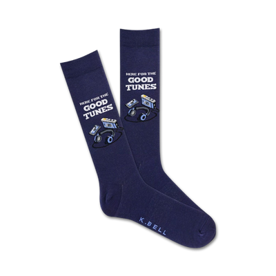 Pair of navy blue crew socks with a graphic design of cassette tapes and headphones. Text reads 'Here For The Good Tunes'.