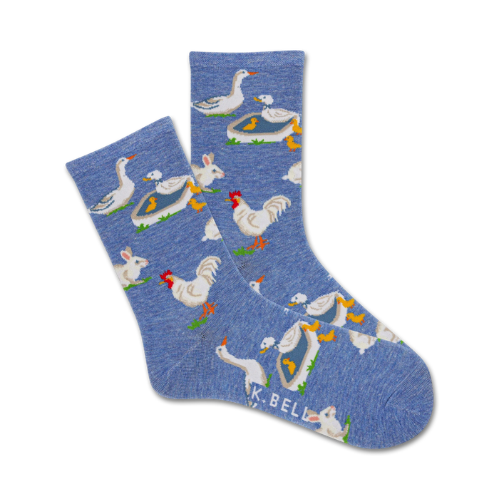 women's crew socks with bright pattern of ducks, chickens, and rabbits on blue.   }}