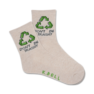 Pair of beige crew socks with a green recycle symbol and 'Don't Be Trashy' text.