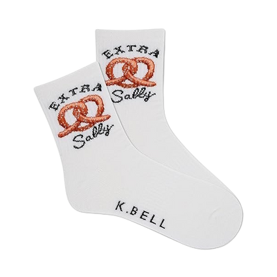 Pair of white crew socks with orange pretzel image and 'Extra Sally' text.  K.BELL logo on the sole.